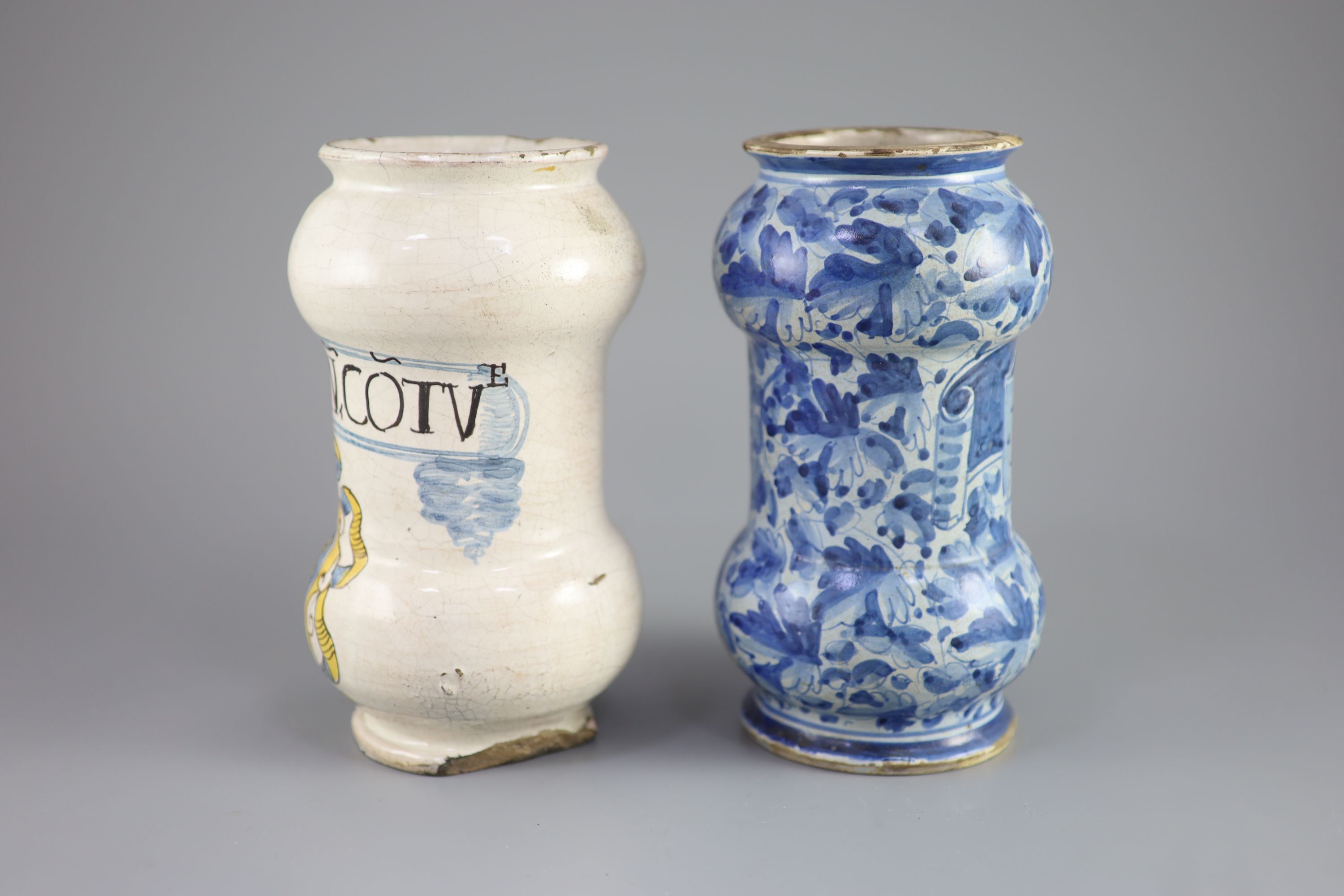 Two Italian maiolica albarello, Savonarola, early 18th century 20cm and 20.5cm high, cracks
